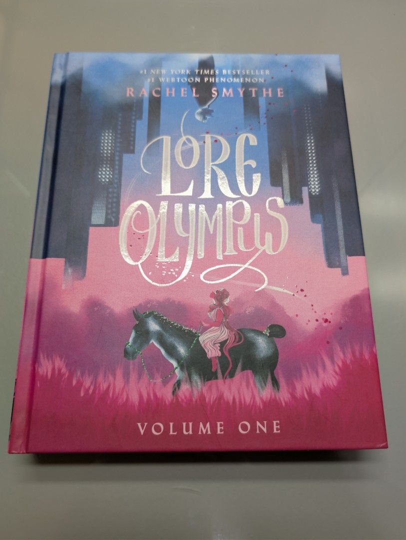 Lore Olympus Volume One by Rachel Smythe Webtoon Comic (Category: Comics & Manga) located in Cavite. Submitted by mikaelhope (Listing ID 1462728111, Image 1). Description: Condition: Used. The binding is tight and the full color pages are pristine. Authentic copy bought from Fully Booked with the original price tag still on the back cover. Inclusions: Volume 1 hardcover only..
