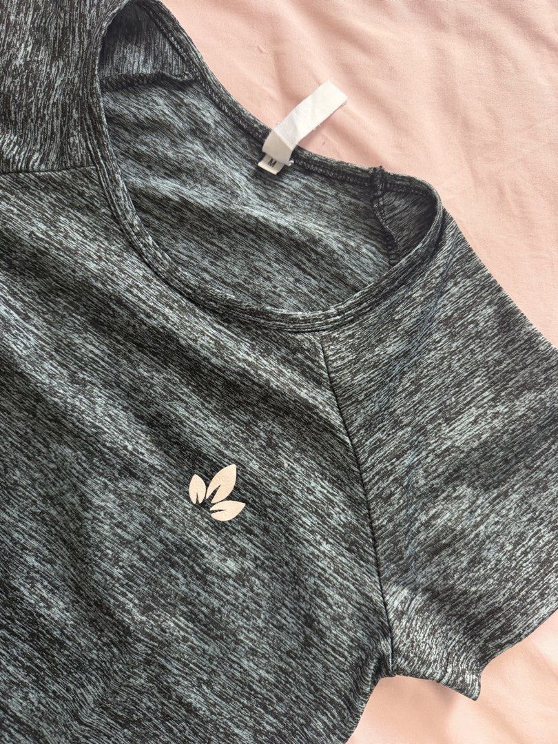 Lotus Activewear Gray T-shirt (Category: Activewear) located in Manila. Submitted by leean0924 (Listing ID 1462884973, Image 3). Description: - Grey marled short sleeve t-shirt - Comfortable material, suitable for active wear - Size: Medium (M) - Ideal for workouts .