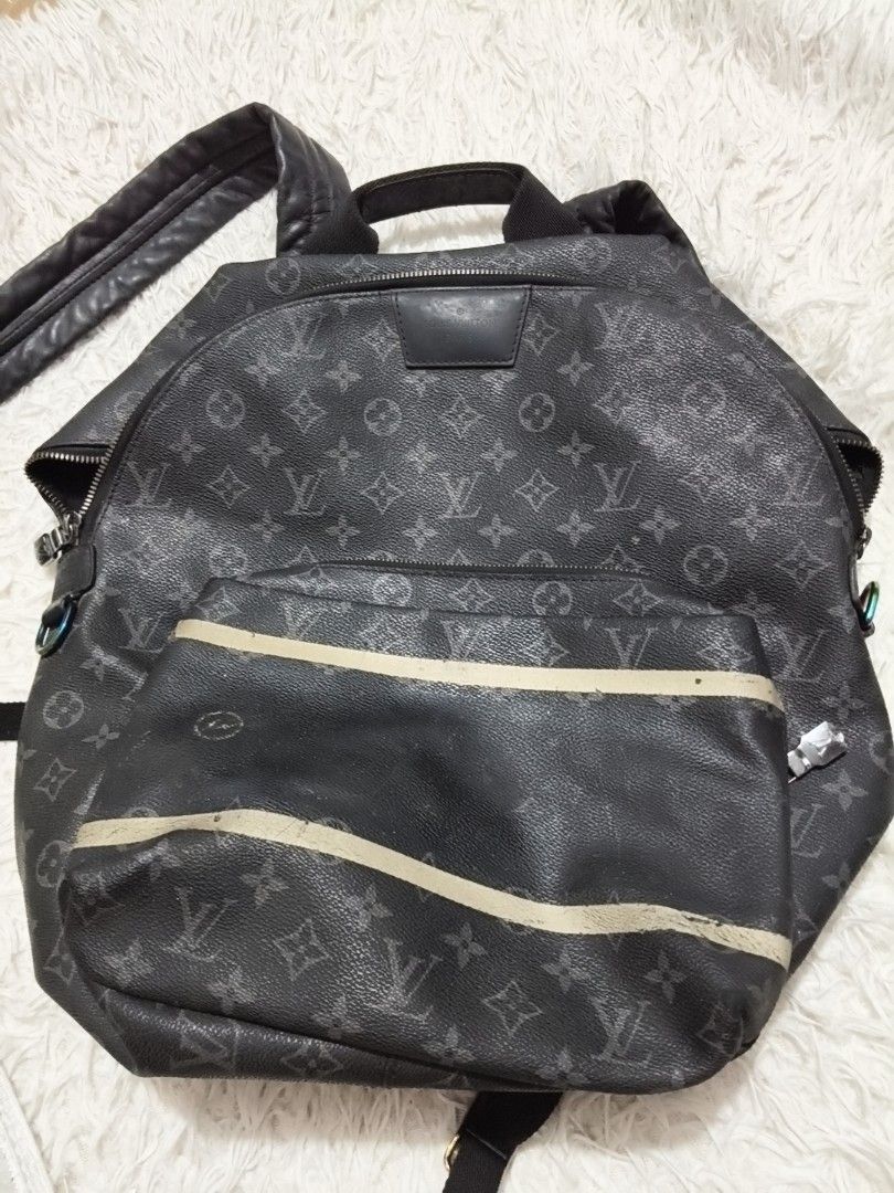Sale!!!!!Louis Vuitton Back Pack Coded TR1466 (Category: Backpacks) located in Pasay City. Submitted by cory0223 (Listing ID 1462734109, Image 1). Description: - Authentic Louis Vuitton x Fragment Design Backpack - Classic monogram pattern in dark grey/black - Front zip pocket with unique stripe detail - Lined interior with 'Made in Italy' tag - Adjustable straps with rainbow iridescent buckles - Ideal for everyday use or travel.