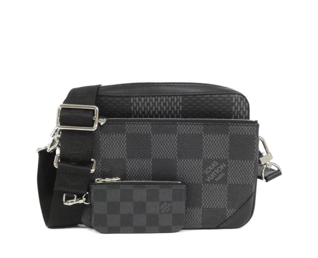 Louis Vuitton Damier Graphite Pouch Set with Strap (Category: Luxury Bags & Wallets) located in Iloilo. Submitted by jtguarnes (Listing ID 1462872569, Image 1). Description: - Authentic Louis Vuitton Damier Graphite pouch set - Includes main pouch and smaller front pouch - Detachable strap with 'LOUIS VUITTON' embossing - Signature Damier Graphite pattern throughout - Comes with original dust bag - Perfect for organizing your essentials.