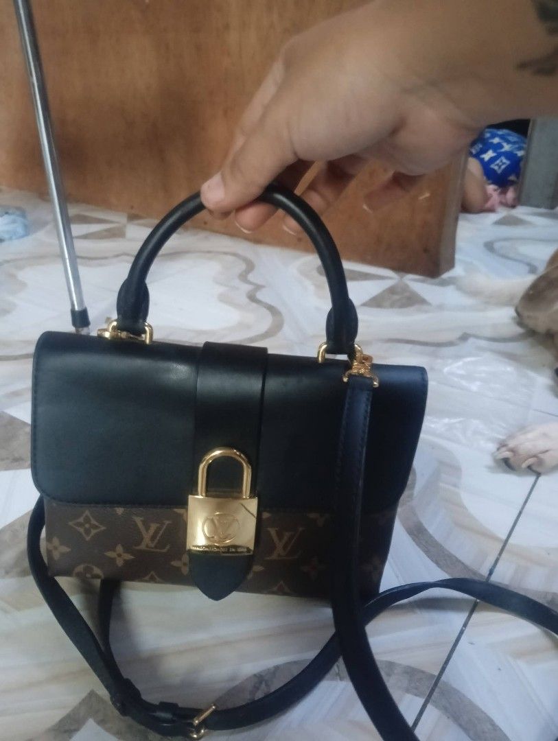 Louis Vuitton Locky BB Monogram Canvas Handbag (Category: Luxury Bags & Wallets) located in Manila. Submitted by feliajenny76751 (Listing ID 1462687506, Image 1). Description: - Authentic Louis Vuitton Locky BB - Iconic Monogram Canvas with Black Leather - Gold-tone Hardware with Functional Lock & Key - Versatile: Top Handle or Detachable Shoulder Strap - Clean Interior.