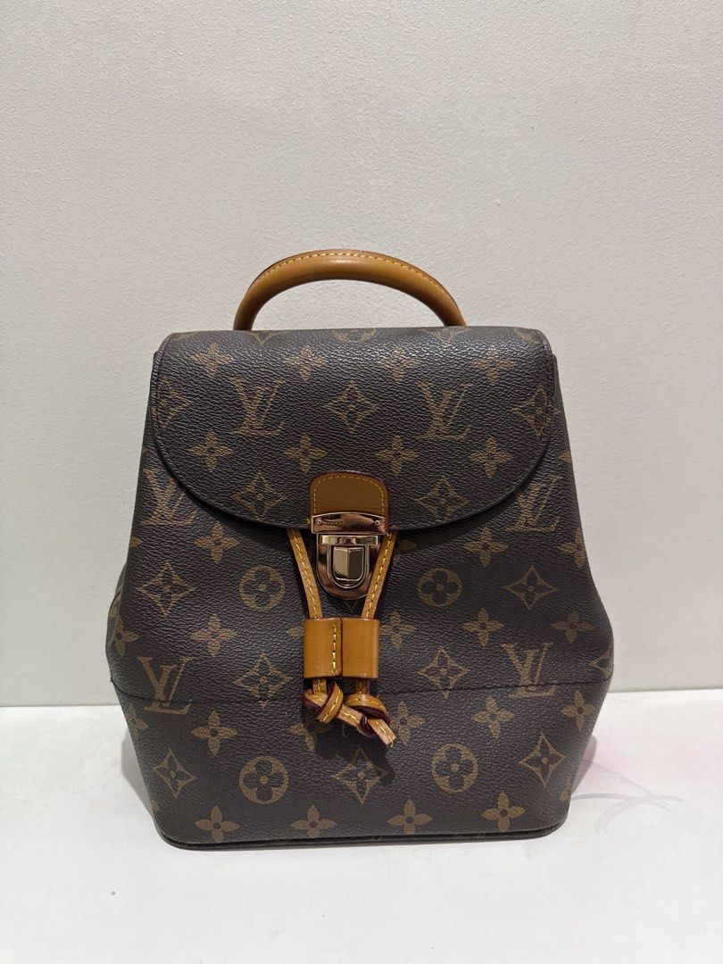 Louis Vuitton Monogram Canvas Backpack (Category: Luxury Bags & Wallets) located in Manila. Submitted by ryiaaa (Listing ID 1462740361, Image 1). Description: - Classic Louis Vuitton monogram backpack - Features iconic LV print all over - Genuine leather trim and handle - Secure drawstring closure with twist-lock clasp - Stylish and practical for everyday use - Ideal for carrying your essentials.