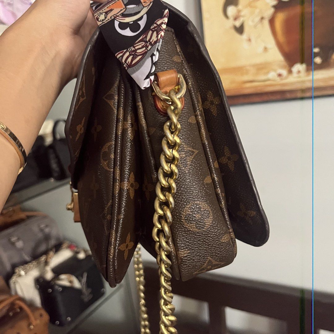 Louis Vuitton Monogram Pochette Metis (Category: Luxury Bags & Wallets) located in Cagayan de Oro. Submitted by kathkoleksyon (Listing ID 1462725835, Image 2). Description: - Classic Louis Vuitton Pochette Metis - Monogram canvas with iconic LV print - Gold hardware - Comes with chain strap - Adorable scarf tied to handle - Interior zip pocket - Spacious for essentials - Versatile for day or night use.