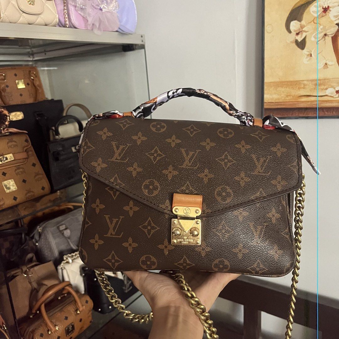 Louis Vuitton Monogram Pochette Metis (Category: Luxury Bags & Wallets) located in Cagayan de Oro. Submitted by kathkoleksyon (Listing ID 1462725835, Image 1). Description: - Classic Louis Vuitton Pochette Metis - Monogram canvas with iconic LV print - Gold hardware - Comes with chain strap - Adorable scarf tied to handle - Interior zip pocket - Spacious for essentials - Versatile for day or night use.