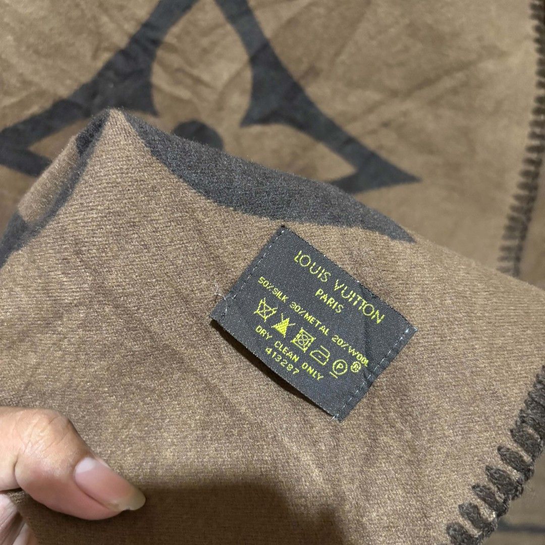 Louis Vuitton Monogram Scarf (Category: Scarves) located in Manila. Submitted by abj_thriftshop (Listing ID 1462836178, Image 3). Description: - Louis Vuitton scarf - Classic brown & black monogram pattern - Care: Dry clean only - A stylish addition to any outfit.