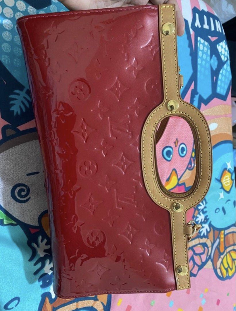 Louis Vuitton Monogram Vernis Roxbury (Category: Luxury Bags & Wallets) located in Tarlac. Submitted by rizasdeclutteringonline (Listing ID 1462853607, Image 2). Description: - Authentic Red Louis Vuitton Monogram Vernis handbag - Features a classic top handle - Includes a detachable shoulder strap for versatile carrying - Elegant gold hardware details - Comes with original dust bag - A timeless and iconic piece for your collection -LV Roxbury - 