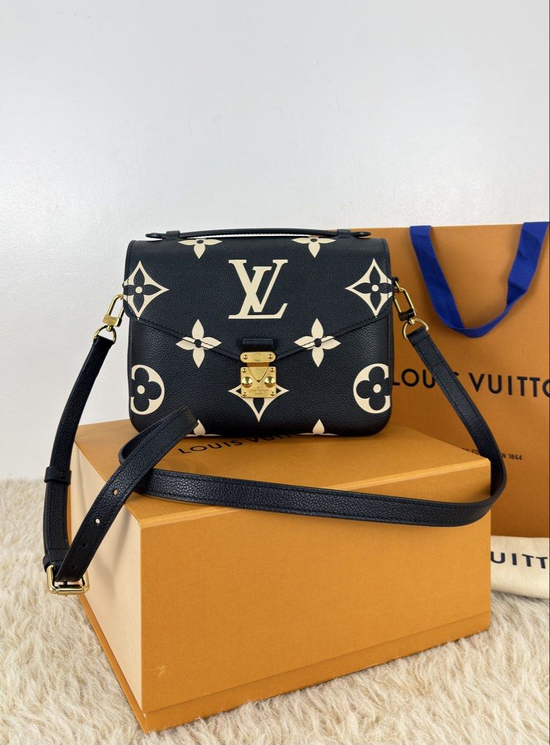Louis Vuitton Pochette Métis Bicolor Monogram Empreinte (Category: Luxury Bags & Wallets) located in Manila. Submitted by luxuryprelovedbagsby_by_agnes (Listing ID 1462844170, Image 1). Description: Excellent Condition Microchipped / With Entrupy Certificate Dimensions: 25cm x 19cm x 7cm.