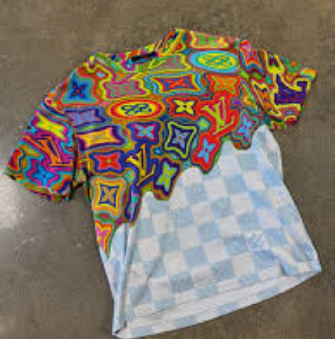 Louis Vuitton Psychedelic Print T-Shirt (Category: Shirts) located in Antipolo. Submitted by castiel2316 (Listing ID 1462709268, Image 1). Description: Louis Vuitton Psychedelic Print T-Shirt Designed during Virgil Abloh's tenure as the artistic director for the brand's menswear, this piece features a vibrant, trippy multicolor interpretation of the iconic LV monogram motif around the top half, which seamlessly morphs and dissolves downward into 