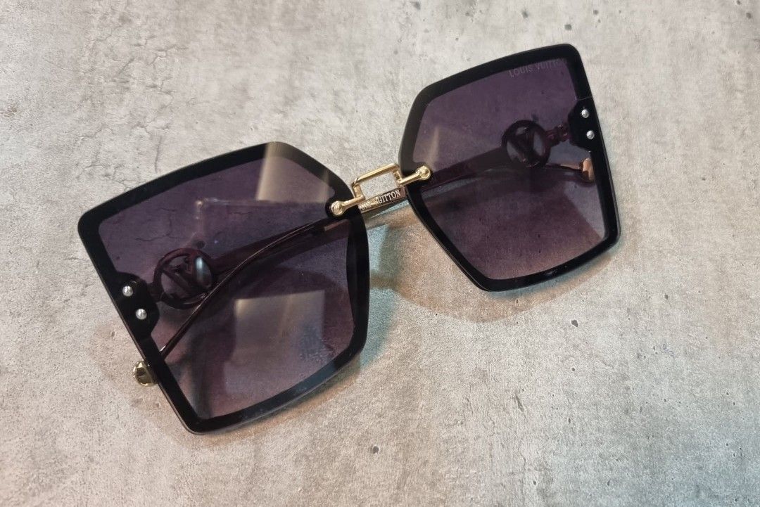 Louis Vuitton Sunglasses Square Black Gold (Category: Sunglasses & Eyewear) located in Makati City. Submitted by zshar (Listing ID 1462837922, Image 2). Description: - Louis Vuitton sunglasses - Stylish square frames in black - Elegant gold accents - Dark tinted lenses - Made in Italy - Perfect accessory for any outfit and sunny days. Bought in Amazon.