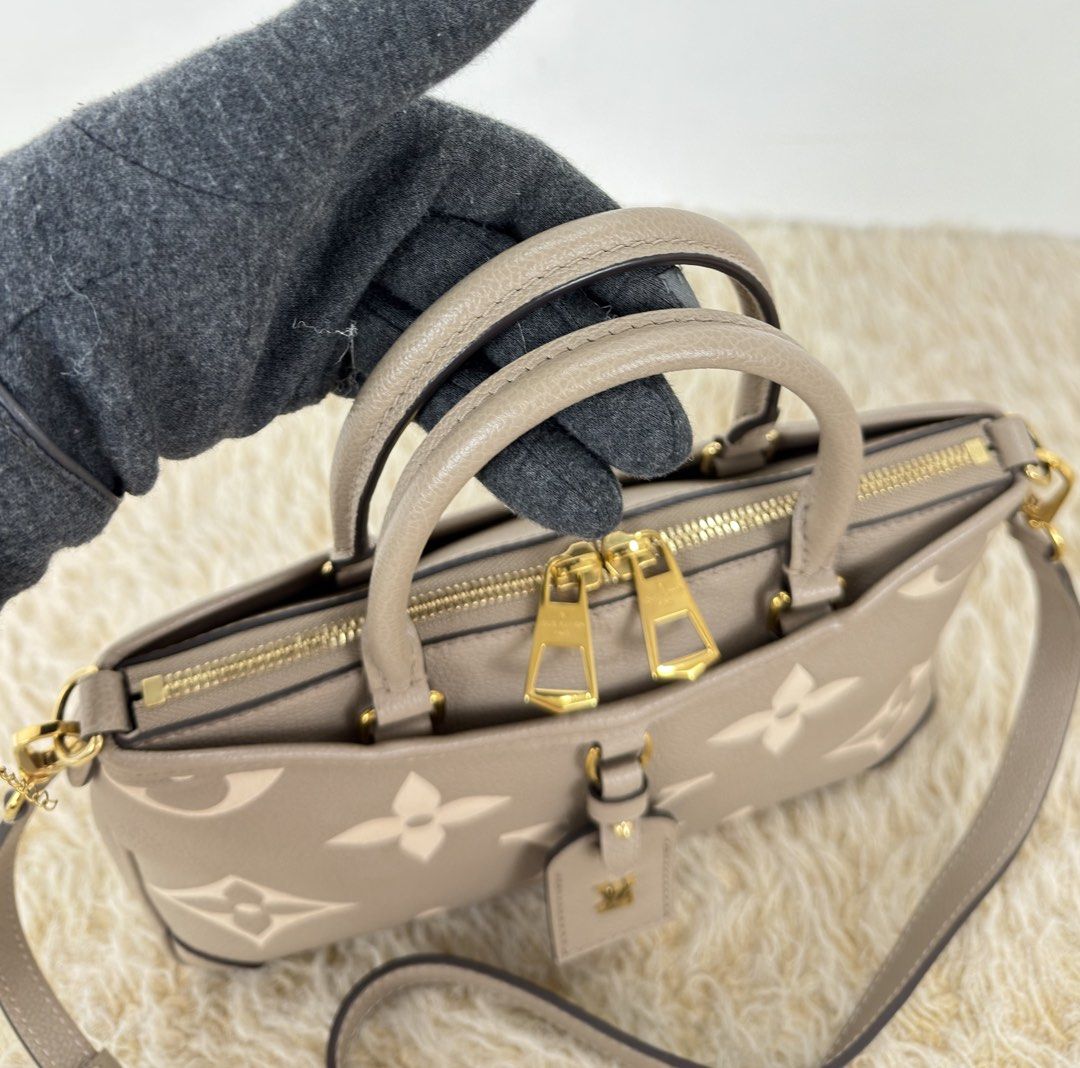 Louis Vuitton Trianon PM Monogram Empreinte (Category: Luxury Bags & Wallets) located in Manila. Submitted by luxuryprelovedbagsby_by_agnes (Listing ID 1462844655, Image 2). Description: 205K SRP Excellent Condition Super Rare Find Microchipped Dimensions: 28cm x 18cm 8cm.