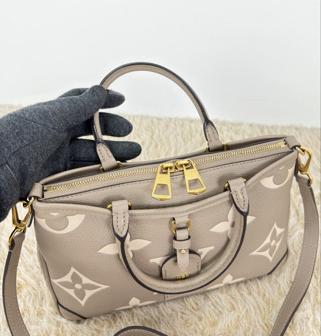 Louis Vuitton Trianon PM Monogram Empreinte (Category: Luxury Bags & Wallets) located in Manila. Submitted by luxuryprelovedbagsby_by_agnes (Listing ID 1462844655, Image 3). Description: 205K SRP Excellent Condition Super Rare Find Microchipped Dimensions: 28cm x 18cm 8cm.
