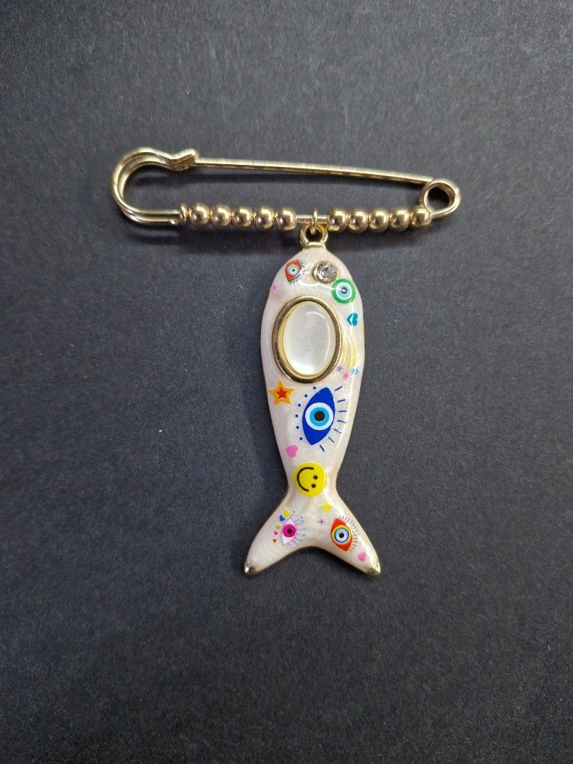 Lucky Fish Pin Brooch (Category: Brooches) located in Taguig. Submitted by mommaschoice (Listing ID 1462799402, Image 1). Description: Brand New Unique brooch design Lightweight won't damage the fabric Ships nationwide.