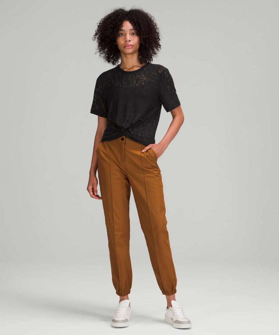 Lululemon Cressent Tee Veil ( dot 6) (Category: Blouses) located in Arayat. Submitted by keenwolf-a7b5 (Listing ID 1462703693, Image 2). Description: - Sheer black fabric - dot 6 - Unique twist front detail - Short sleeves - Crew neck - Subtle patterned texture - Versatile for dressing up or down - Perfect for layering or wearing solo - Easy to style with pants or skirts.