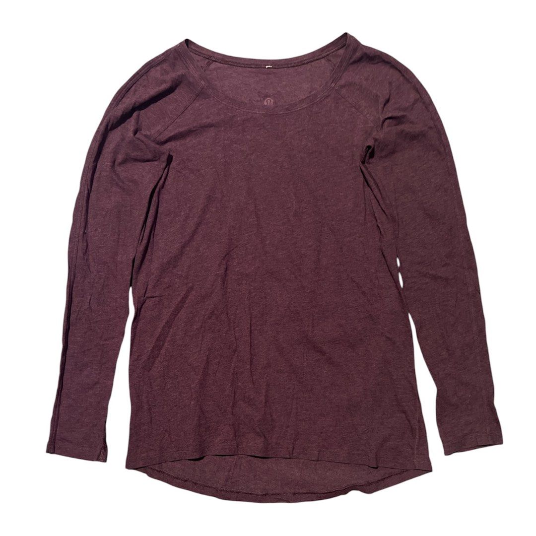 Lululemon Emerald Long Sleeve dot 6 (Category: Activewear) located in Iba. Submitted by xooperfindslb (Listing ID 1462857740, Image 3). Description: Lululemon Emerald Long Sleeve Black Cherry (not sure sa exact color ) plse see actual pic for reference Dot 6 Armpit to armpit width - 17” No issue .