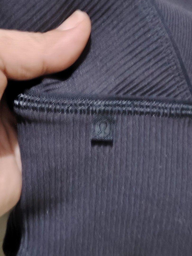 Lululemon Ribbed Crop Tank Top Black (Category: Activewear) located in Santa Rosa. Submitted by RRRR0520 (Listing ID 1462804265, Image 2). Description: - Brand: Lululemon - Item: Black ribbed crop tank top - Features: High neckline, sleeveless design - Support: Wide ribbed band at the bottom - Material: Comfortable and stretchy - Versatile: Great for workouts or casual wear - Detail: Shows Lululemon logo tag.