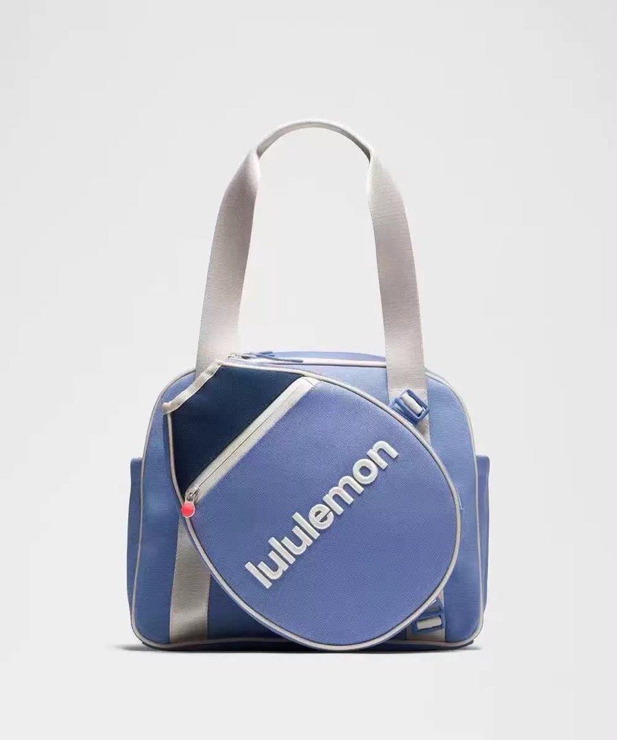 Lululemon Small Paddle Bag - Tennis/Pickleball (Category: Other Sports Equipment and Supplies) located in Manila. Submitted by kendsg (Listing ID 1462689467, Image 2). Description: - Brand new Lululemon paddle bag - Small size, ideal for racket and essentials - Clean design with embossed Lululemon logo on front pocket - Includes shoulder strap - Perfect for hitting the court - Tags still attached.