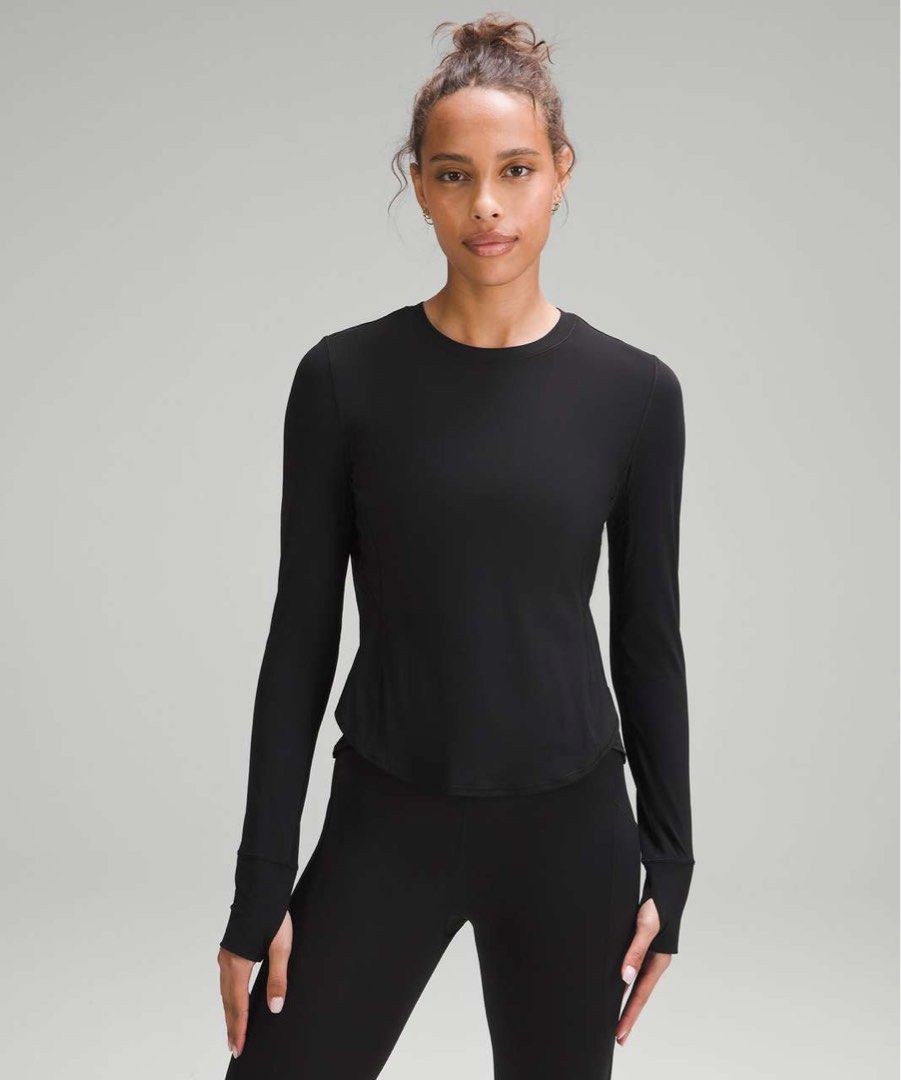 Lululemon UV Protection Fold-Over Running LS dot 4 (Category: Activewear) located in Iba. Submitted by xooperfindslb (Listing ID 1462861515, Image 2). Description: Lululemon UV Protection Fold-Over Running Long-Sleeve Shirt Black Cut tag Dit 4 base on size guide Armpit to armpit - 17” No issue Good condition Like new.