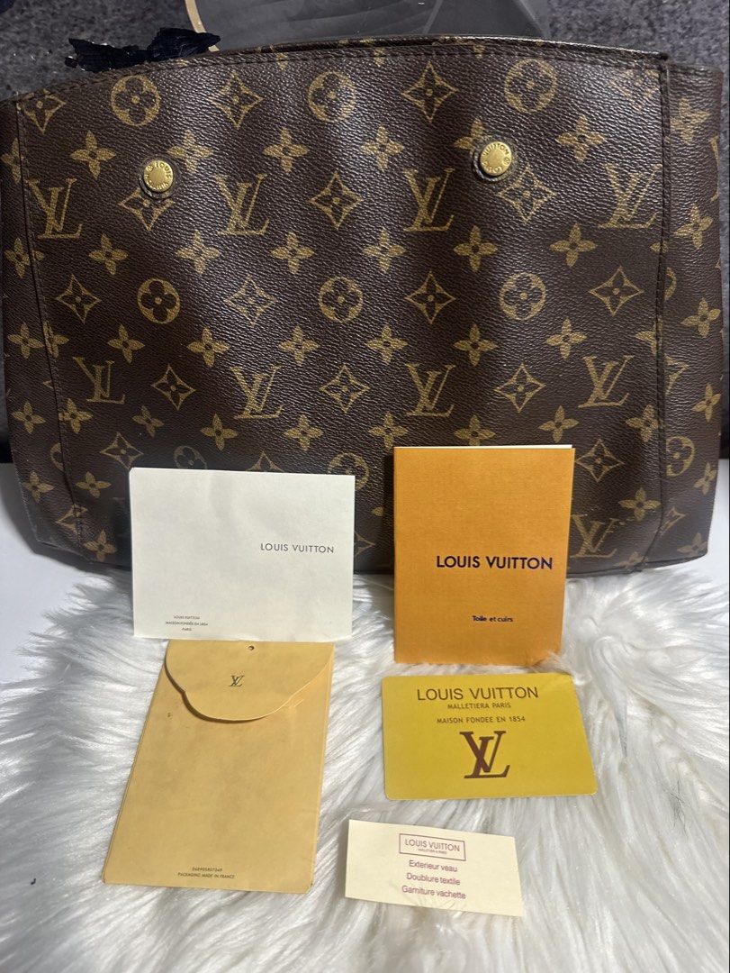 LV monogram (Category: Luxury Bags & Wallets) located in Caloocan City. Submitted by trebdy01 (Listing ID 1459183685, Image 2). Description: LV Monogram Bag for Sale 🤎 Brown LV Monogram Tote Bag + Matching Pouch with code Heavy/sturdy feel with leather trim and handles. Classic brown monogram design. Pre-owned condition 8000 negotiable Barely used na Please check the photos and message me for more details. 😊.