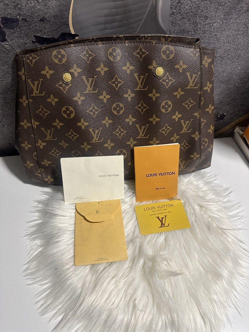 LV monogram (Category: Luxury Bags & Wallets) located in Caloocan City. Submitted by trebdy01 (Listing ID 1459183685, Image 3). Description: LV Monogram Bag for Sale 🤎 Brown LV Monogram Tote Bag + Matching Pouch with code Heavy/sturdy feel with leather trim and handles. Classic brown monogram design. Pre-owned condition 8000 negotiable Barely used na Please check the photos and message me for more details. 😊.