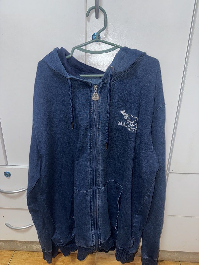 Macbeth Blue Denim Zip-Up Hoodie (Category: Coats, Jackets and Outerwear) located in Manila. Submitted by quintessesommerset (Listing ID 1462877135, Image 1). Description: - Macbeth blue denim zip-up hoodie 24x29 - Embroidered Macbeth logo on chest - Drawstring hood - Front pockets - Ideal for casual wear.