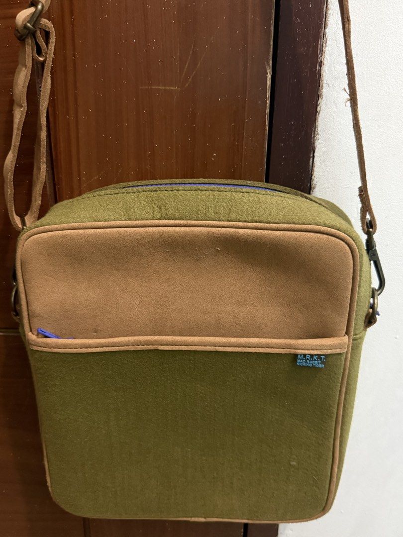 Mad Rabbit sling bag (Category: Sling Bags) located in Pasig City. Submitted by simply.trish (Listing ID 1462823075, Image 2). Description: Mad Rabbit Brand new Original Color: Brown and army green Unisex.