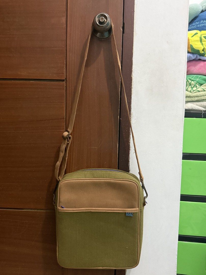Mad Rabbit sling bag (Category: Sling Bags) located in Pasig City. Submitted by simply.trish (Listing ID 1462823075, Image 3). Description: Mad Rabbit Brand new Original Color: Brown and army green Unisex.