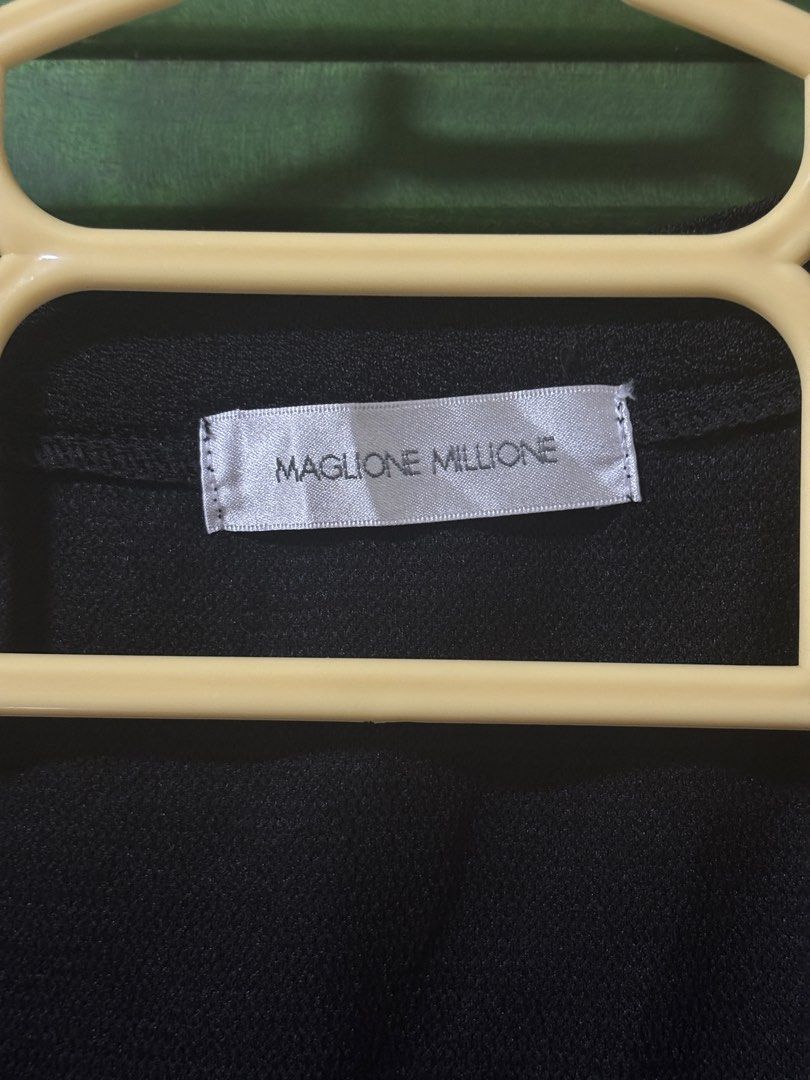 MAGLIONE MILLIONE Black Vest with Floral Patchwork (Category: Sleeveless) located in Ilagan. Submitted by ystroberry (Listing ID 1462793758, Image 2). Description: - Brand: MAGLIONE MILLIONE - Color: Black - Style: Vest - Features: Unique patchwork design on front left, pocket on right - Closure: Button-up - Versatile: Great for layering and styling with various outfits fits S-M .