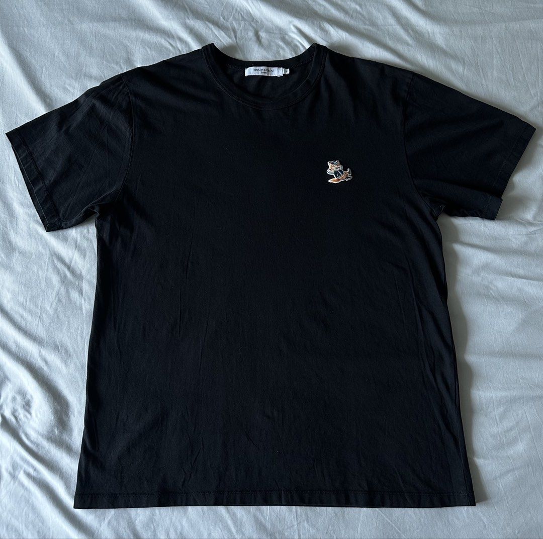 Maison Kitsune Tshirt (Category: Tshirts & Polo Shirts ) located in Manila. Submitted by specsphmnl (Listing ID 1462766699, Image 1). Description: Maison Kitsune Dressed Fox Patch Classic Tee XL (22x28.5 inches) Unisex 100% Original In very good condition (used once only) Personal used ₱3,500 Meet up Location: -Don Carlos Palanca St., Legaspi Village, Makati Shipping: Grab or Lalamove (buyer will shoulder shipping fee).