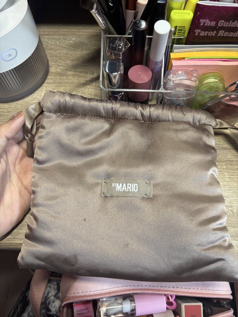 Makeup by Mario Makeup Pouch (Category: Makeup) located in Davao. Submitted by mielle_888 (Listing ID 1462695110, Image 1). Description: ✨Makeup by Mario makeup organizer pouch ✨Small stain at the bottom due to lip oil but removable ✨ 2 compartments All pre-loved items will be washed/sanitized prior to shipping .