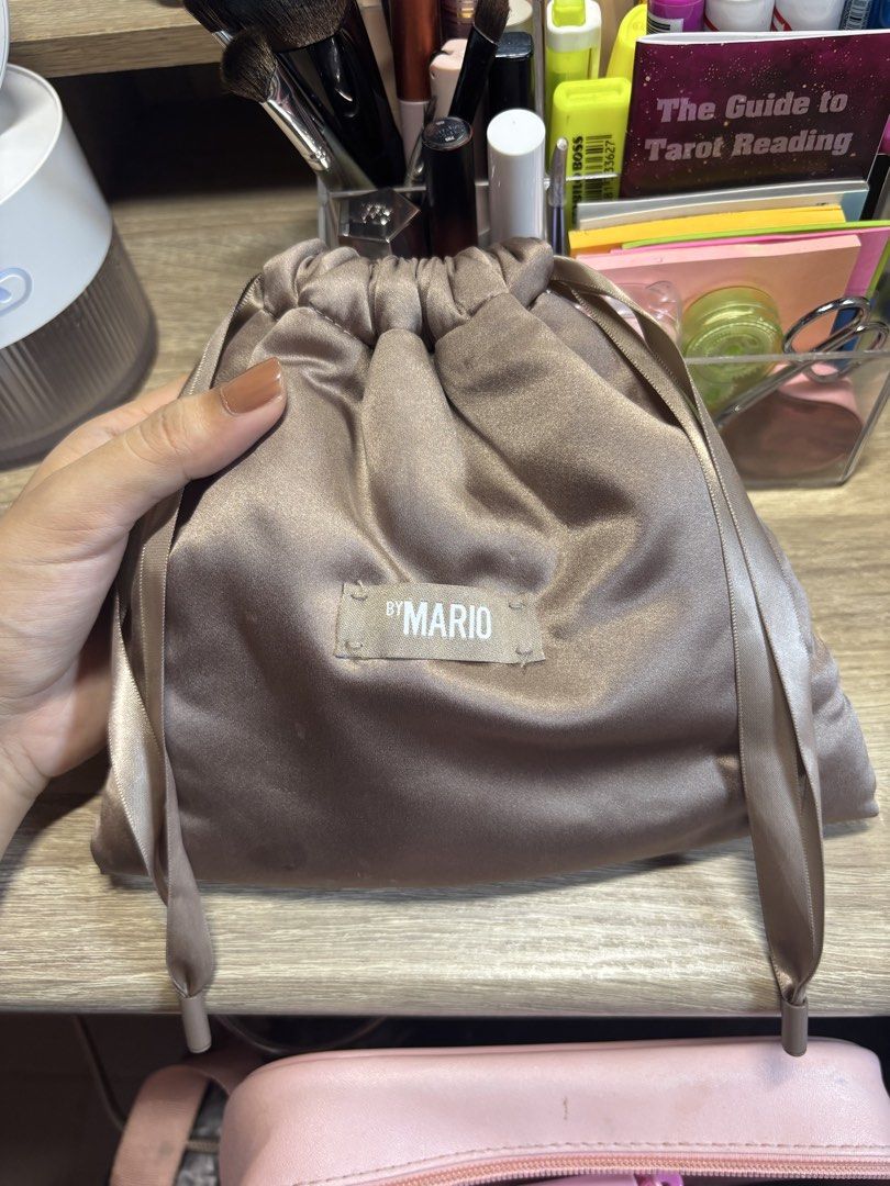 Makeup by Mario Makeup Pouch (Category: Makeup) located in Davao. Submitted by mielle_888 (Listing ID 1462695110, Image 2). Description: ✨Makeup by Mario makeup organizer pouch ✨Small stain at the bottom due to lip oil but removable ✨ 2 compartments All pre-loved items will be washed/sanitized prior to shipping .