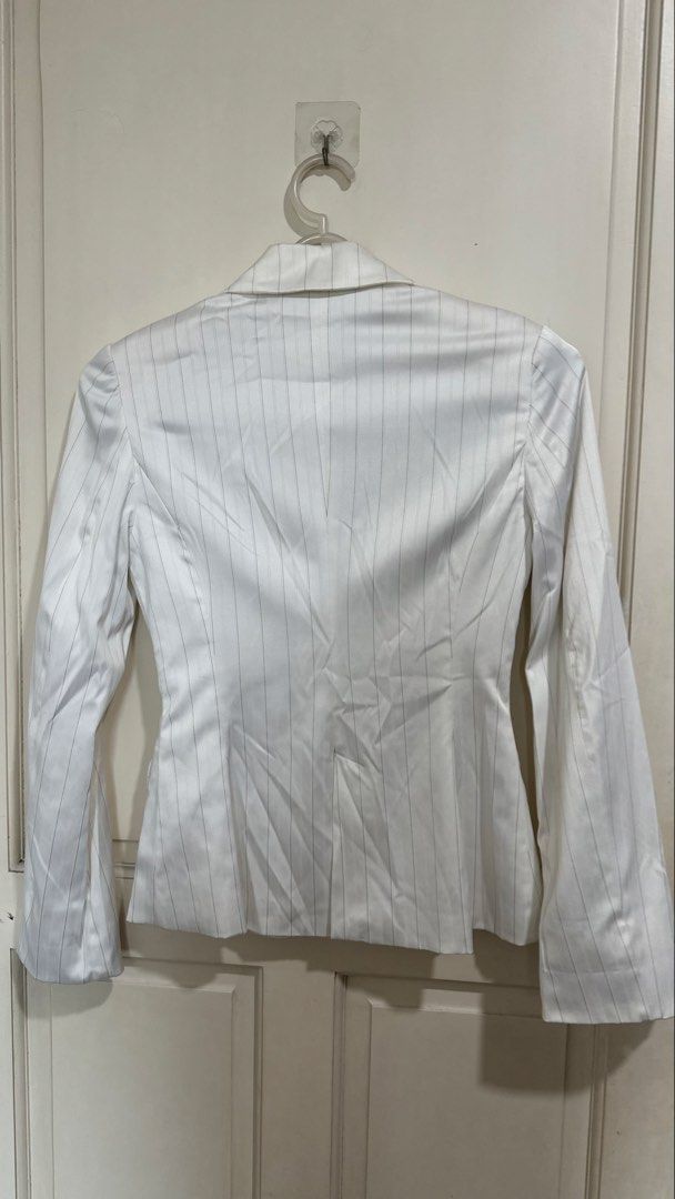 Mango Suit White Pinstripe Blazer (Category: Coats, Jackets and Outerwear) located in Mandaluyong City. Submitted by yv.stuff (Listing ID 1462768762, Image 3). Description: - MNG SUIT white blazer - Subtle pinstripe detail - Two-button front closure - Two flap pockets - Sharp and professional look - Ideal for work or dressing up outfits - Size: EUR 36 / USA 4.