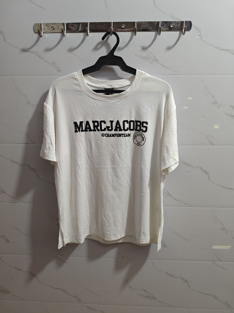 Marc Jacobs Champion Team Men Tshirt (Category: Tshirts & Polo Shirts ) located in Baguio. Submitted by cool_chic (Listing ID 1462737744, Image 1). Description: Marc Jacobs Unisex Tshirt Color Rate 9.5/10 Flaw Stains Complete Tags Cotton Tela Need Wash Size Medium Dimes 22 Width 25 Length Price P189 .