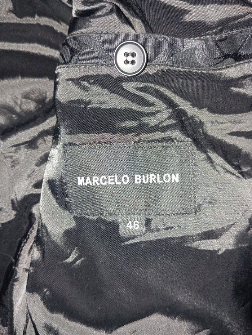 Marcelo Burlon Bomber Jacket Black Patches Size 46 (Category: Coats, Jackets and Outerwear) located in Guihulngan. Submitted by jaylordfra13193 (Listing ID 1462861425, Image 2). Description: - Brand: Marcelo Burlon - Style: Bomber Jacket - Color: Black - Design: All-over pattern with multiple front patches - Closure: Zipper - Size: 46 - Origin: Made in Italy - Condition: Please check photos for details Dimes 20x25.5.