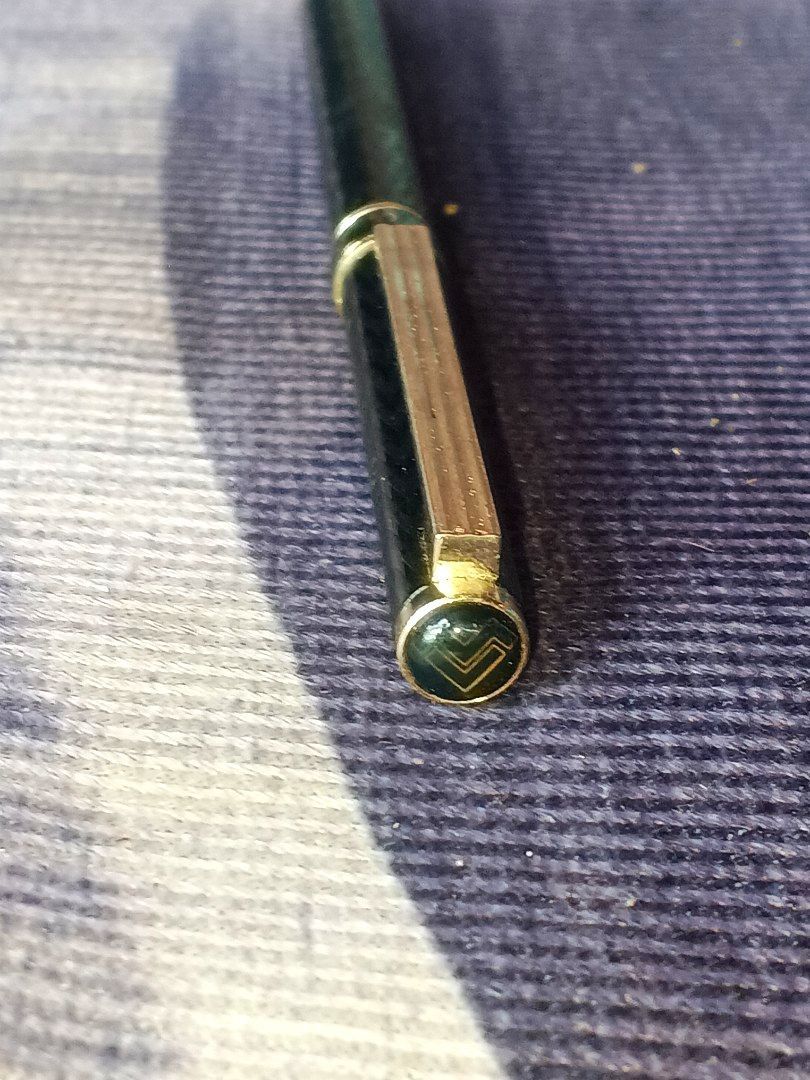 Mario Valentino Pen with Original Box (Category: Stationery & School Supplies) located in Manila. Submitted by icamalicdem29 (Listing ID 1462691147, Image 3). Description: - Vintage Mario Valentino Pen - Color: Black with Gold Accents - Features: Patterned Barrel and Clip - Includes: Original Presentation Box, Ribbon, and Booklet - Ideal for: Collectors.