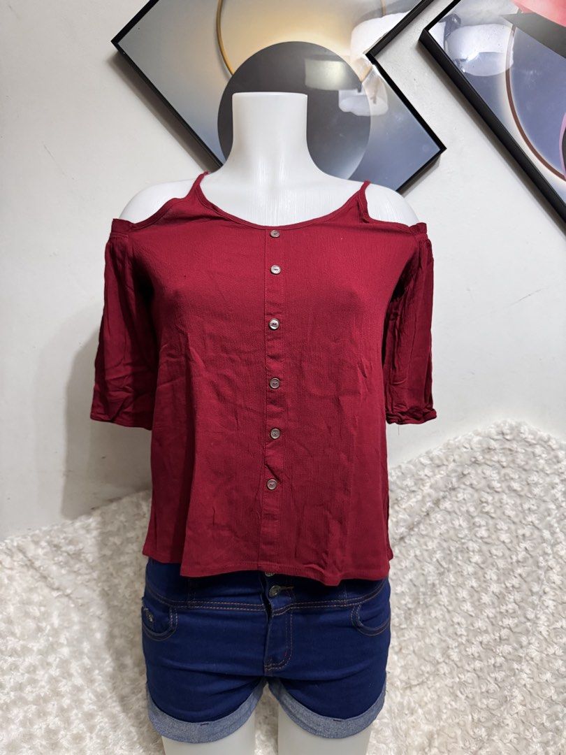 Maroon off Shoulder blouse (Category: Blouses) located in Marikina City. Submitted by lorradel (Listing ID 1462771869, Image 1). Description: - fits S-M - Maroon cold shoulder top - Button-down design - Short sleeves off shoulder - Versatile: pairs well with shorts or jeans - Ideal for casual outings - Comfortable fabric - MAY HAVE some washable stains (hindi maiiwasan) needs washing; had been stored - mannequin size 34-26-34 - mannequin’s should