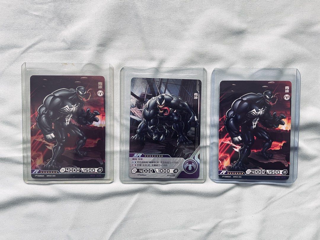 Marvel - Kayou Venom Trading Card Set (Category: Raw Singles) located in Cavite. Submitted by _aele3 (Listing ID 1462691407, Image 1). Description: - Set of 3 Marvel Hero Battle cards featuring Venom. - 2x Venom cards (R rarity): 4000 Attack / 1500 Defense each. - 1x Venom card (SR rarity): 4000 Attack / 1000 Defense. - All cards are in protective sleeves. - Ideal for Marvel card collectors!.
