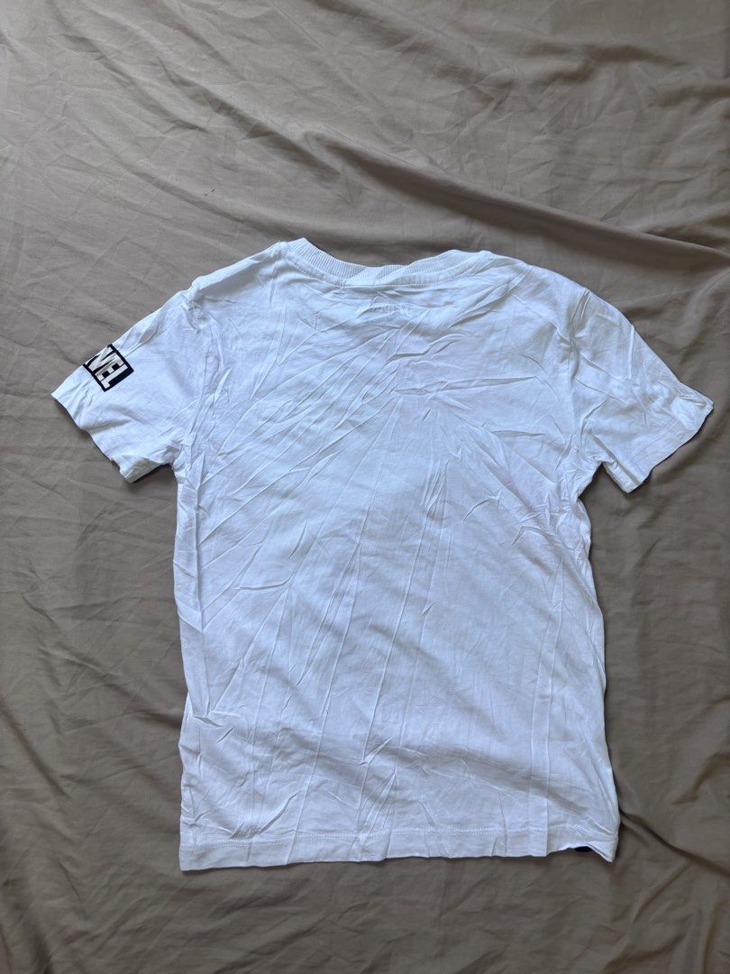 Marvel Spider-Man White T-Shirt (Category: Babies & Kids Fashion) located in Andop. Submitted by ukaylangpo (Listing ID 1462769466, Image 2). Description: - Awesome Spiderman graphic print on the front - Official Marvel logo detail on the sleeve - Brand: Next - Size: (Please refer to measurements) - Measurements: Approx. 18 inches (pit to pit) x 24 inches (length) - Ideal for any Marvel or Spiderman enthusiast - Check photos for condition and det