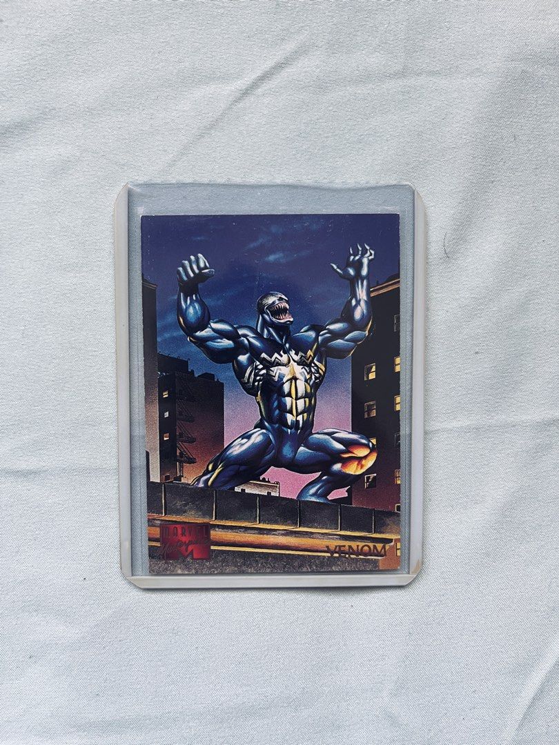 Marvel Venom Carnage Trading Card (Category: Raw Singles) located in Cavite. Submitted by _aele3 (Listing ID 1462708445, Image 1). Description: - 1994 Fleer trading card - Features Venom and Carnage - Card number 106 - Dynamic artwork of Venom on the front - Character info and quote on the back - Must-have for Marvel collectors!.