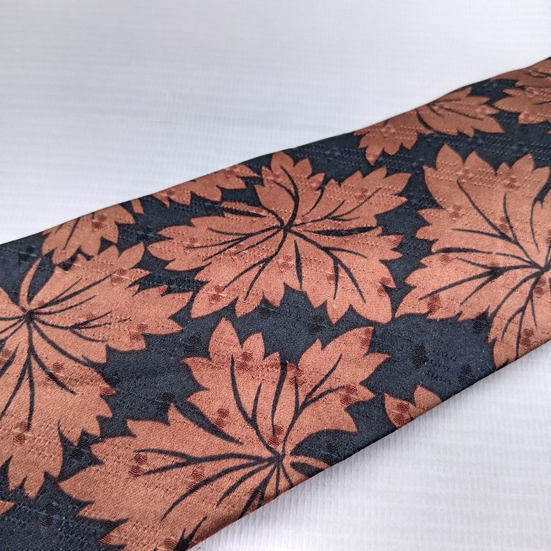 Massimo Terracotta Maple Leaf Pattern Dark Blue Woven Regular/ Classic Silk Necktie (Category: Ties) located in Abucay. Submitted by gibzzz123 (Listing ID 1462797266, Image 3). Description: Regular / Classic Necktie width 9cm • All items are ON HAND and ready to be shipped/picked up. • Items are preloved/ukay, so please expect minimal signs of usage unless stated otherwise. • No major issues — good condition unless otherwise indicated in the list