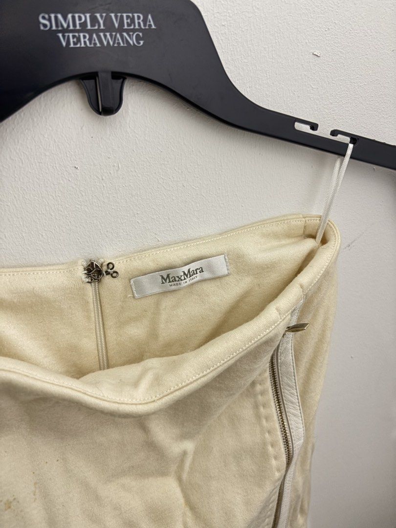 Max mara skirt (Category: Luxury Apparel) located in Manila. Submitted by kingblaize (Listing ID 1462815284, Image 2). Description: Max Mara cream asymmetrical zipper pencil skirt,.
