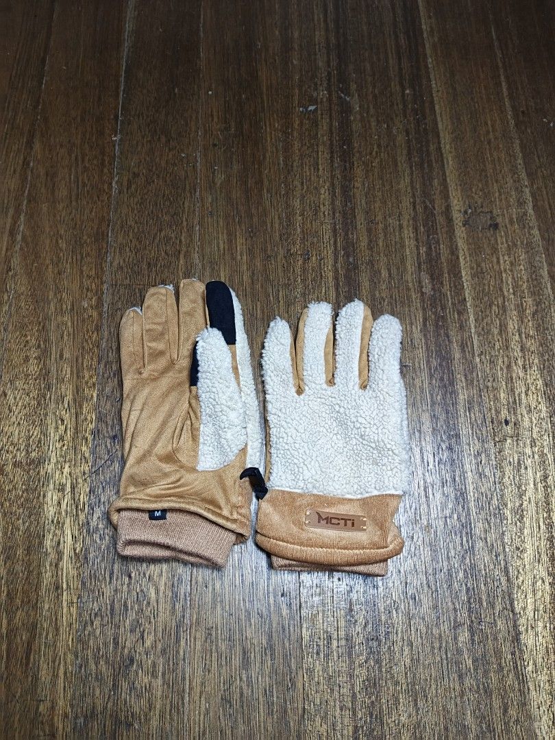 MCTI Fleece Lined Winter Gloves Size M (Category: Gloves) located in Mandaluyong City. Submitted by heatgear (Listing ID 1462833065, Image 1). Description: - Brand: MCTI - Exterior: Tan suede-like material - Lining: Fuzzy herpa - Cuffs: Ribbed for a snug fit - Size: Medium (M) - Features: Keeps hands warm in cold weather.