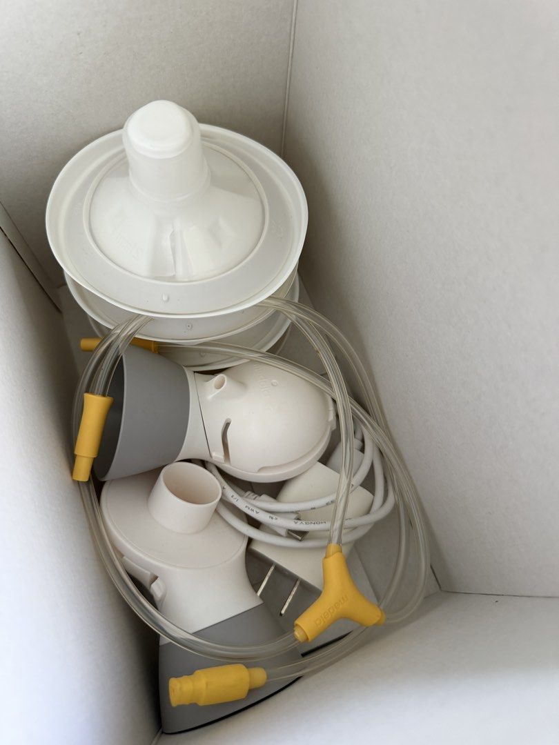 Medela Swing Maxi Double Electric Breast Pump (Category: Breastfeeding & Bottle Feeding) located in Taguig. Submitted by teamarbo (Listing ID 1462707729, Image 3). Description: - Medela Swing Maxi double electric breast pump - Easy to use and portable - Faster USB charging - Improved mobility for pumping on the go - Includes all parts shown in the photos - Ideal for mothers needing efficient milk expression Used only twice (since baby opted for f