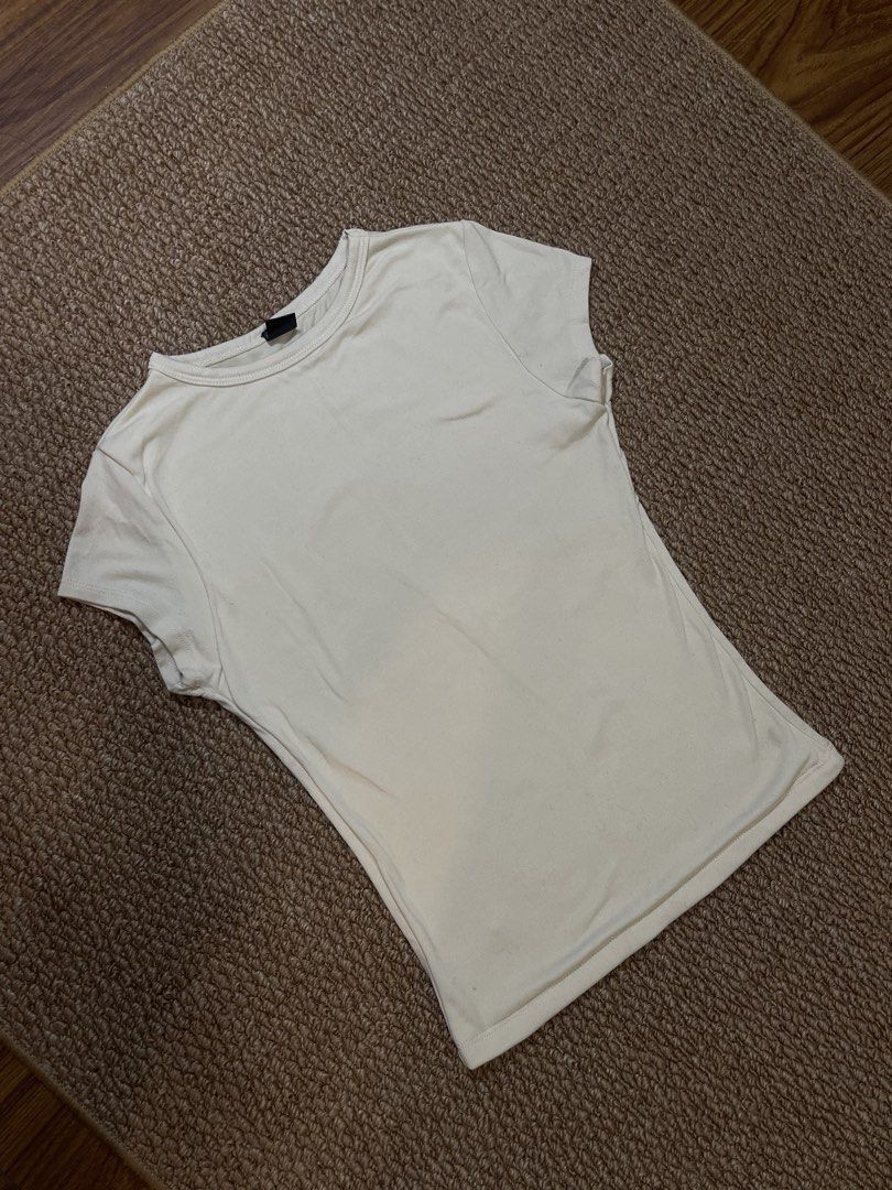 MERA Cream T-Shirt (Category: Shirts) located in Pasig City. Submitted by miafml-closet-cleanout (Listing ID 1462769673, Image 3). Description: posted price is fixed ♡ will not respond to hagglers. 💵 mop: gcash / bdo / maribank / unionbank 🛵 courier: any as long as arranged by buyer 🙅🏻‍♀️ no requested worn photos ❌ no meet-ups.