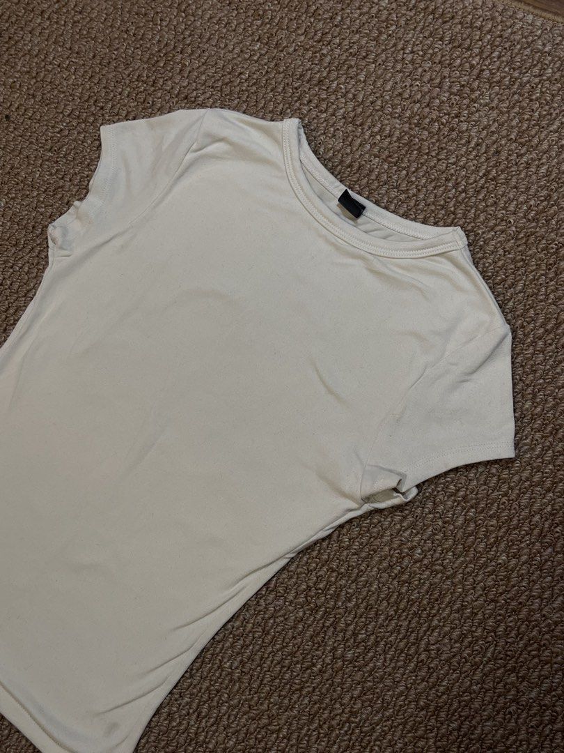 MERA Cream T-Shirt (Category: Shirts) located in Pasig City. Submitted by miafml-closet-cleanout (Listing ID 1462769673, Image 2). Description: posted price is fixed ♡ will not respond to hagglers. 💵 mop: gcash / bdo / maribank / unionbank 🛵 courier: any as long as arranged by buyer 🙅🏻‍♀️ no requested worn photos ❌ no meet-ups.