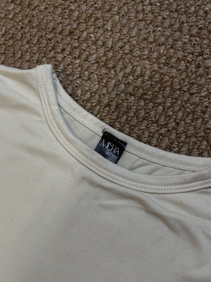 MERA Cream T-Shirt (Category: Shirts) located in Pasig City. Submitted by miafml-closet-cleanout (Listing ID 1462769673, Image 1). Description: posted price is fixed ♡ will not respond to hagglers. 💵 mop: gcash / bdo / maribank / unionbank 🛵 courier: any as long as arranged by buyer 🙅🏻‍♀️ no requested worn photos ❌ no meet-ups.