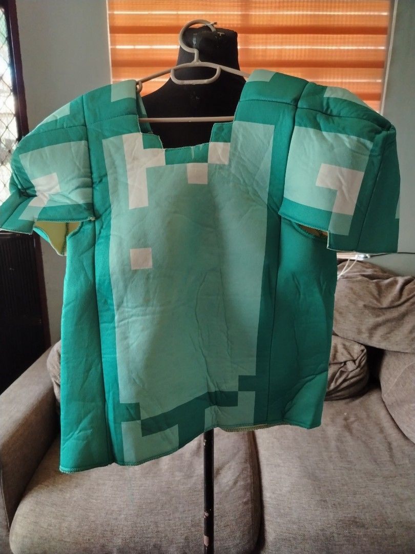 Minecraft Diamond Armor Costume Set (Category: Babies & Kids Fashion) located in General Tinio. Submitted by crisantacruz (Listing ID 1462844651, Image 3). Description: - Become your favorite Minecraft character with this Diamond Armor costume set. - Includes a comfortable top and pants designed to look like iconic diamond armor. - Perfect for cosplay events, Halloween, or themed parties. - Officially licensed Minecraft merchandise..