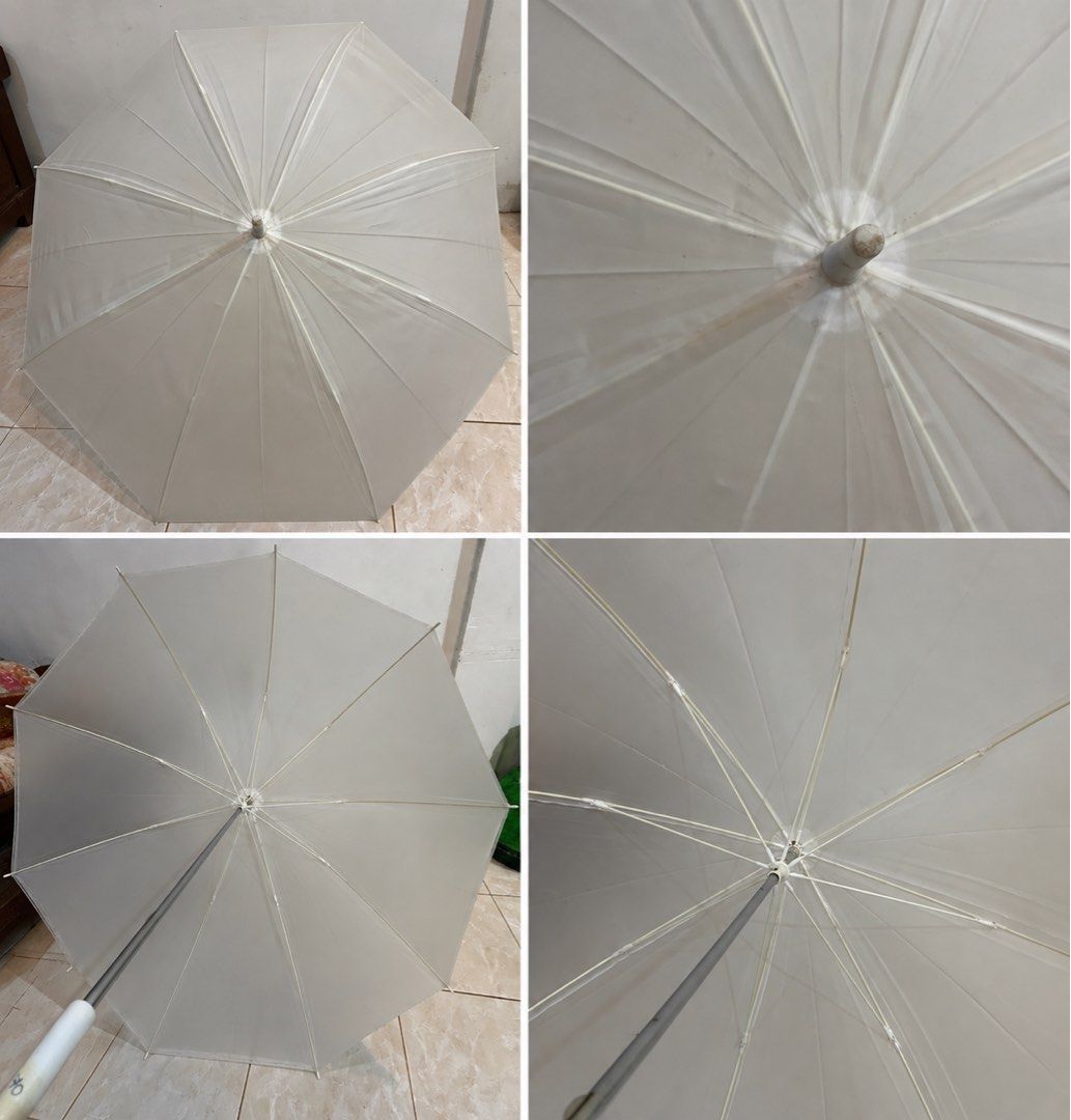 minimalist white long-handle umbrella (Category: Umbrellas) located in San Fernando. Submitted by dntjapansurpluselyu (Listing ID 1462796982, Image 1). Description: .