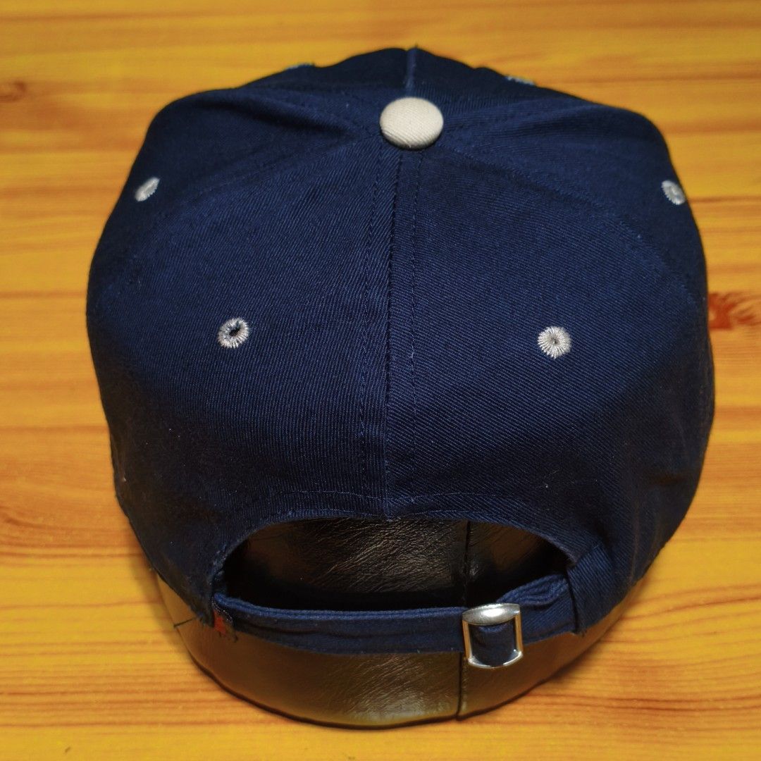 Miniso Japan Navy Blue & Beige Snapback Cap (Category: Caps & Hats) located in Manila. Submitted by caps08 (Listing ID 1462875450, Image 3). Description: - Navy blue cap with a stylish beige brim. - Unique circular embroidery featuring stars and 'ONE' in the center. - Adjustable strap at the back for a comfortable, customized fit. - Authentic Miniso Life branding inside. - Ideal for adding a cool, casual vibe to any outfit..