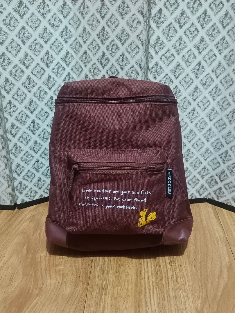MISDO CLUB KIDS BACKPACK (Category: Other Babies Going Out Needs) located in Makati City. Submitted by nyxhemera26 (Listing ID 1462819470, Image 1). Description: MISDO CLUB KIDS BACKPACK - Like new - Adorable maroon mini backpack - Features a small front pocket with a cute quote - Adjustable straps for a comfortable fit - Surprisingly spacious interior for its size - Ideal for carrying your daily essentials - Perfect compact size for kids.