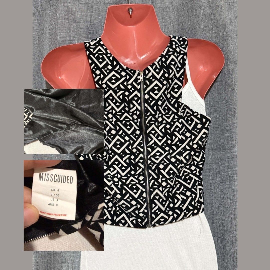 MISSGUIDED Geometric Cross-Front Crop Top 🖤🤍 (Category: Sleeveless) located in Marikina City. Submitted by styledandsassified (Listing ID 1462768790, Image 2). Description: Brand: Missguided Details: Criss-cross halter neckline, full back zip closure, fully lined, structured fitted crop. Pattern/Color: Black & White Geometric / Tribal Print Size: UK 8 / US 4 / EU 36 / AUS 8 Reminders: Pls manage expectations as this is a thrifted item. Mannequi